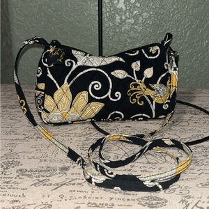 Black Vera Bradley quilted shoulder bag in the retired "Yellow Bird" pattern